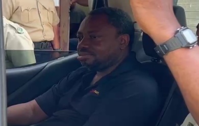 BELIZE-Haitian American national charged with murder.