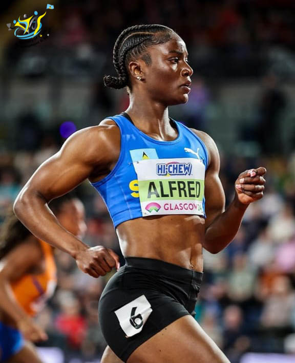 Kenson Casimir congratulates Julien Alfred for her historic win
