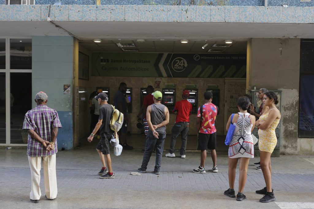 Long lines form and frustration grows as Cuba runs short of cash – Caribbean Life